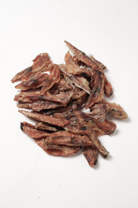 Ailes de poulet séchées – friandises naturelles pour chien, riches en protéines et calcium, idéales pour la mastication et l’hygiène dentaire.