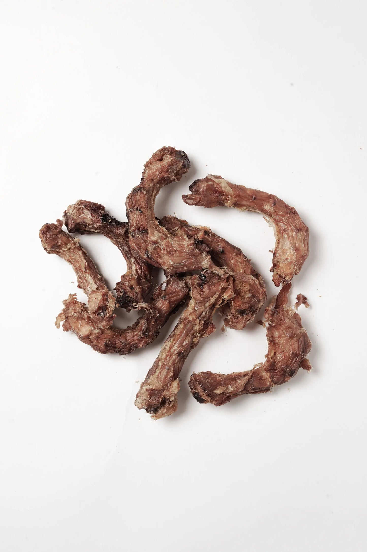 Cous de poulet séchés – friandises naturelles pour chien, riches en protéines et calcium, idéales pour la mastication et l’entretien des dents