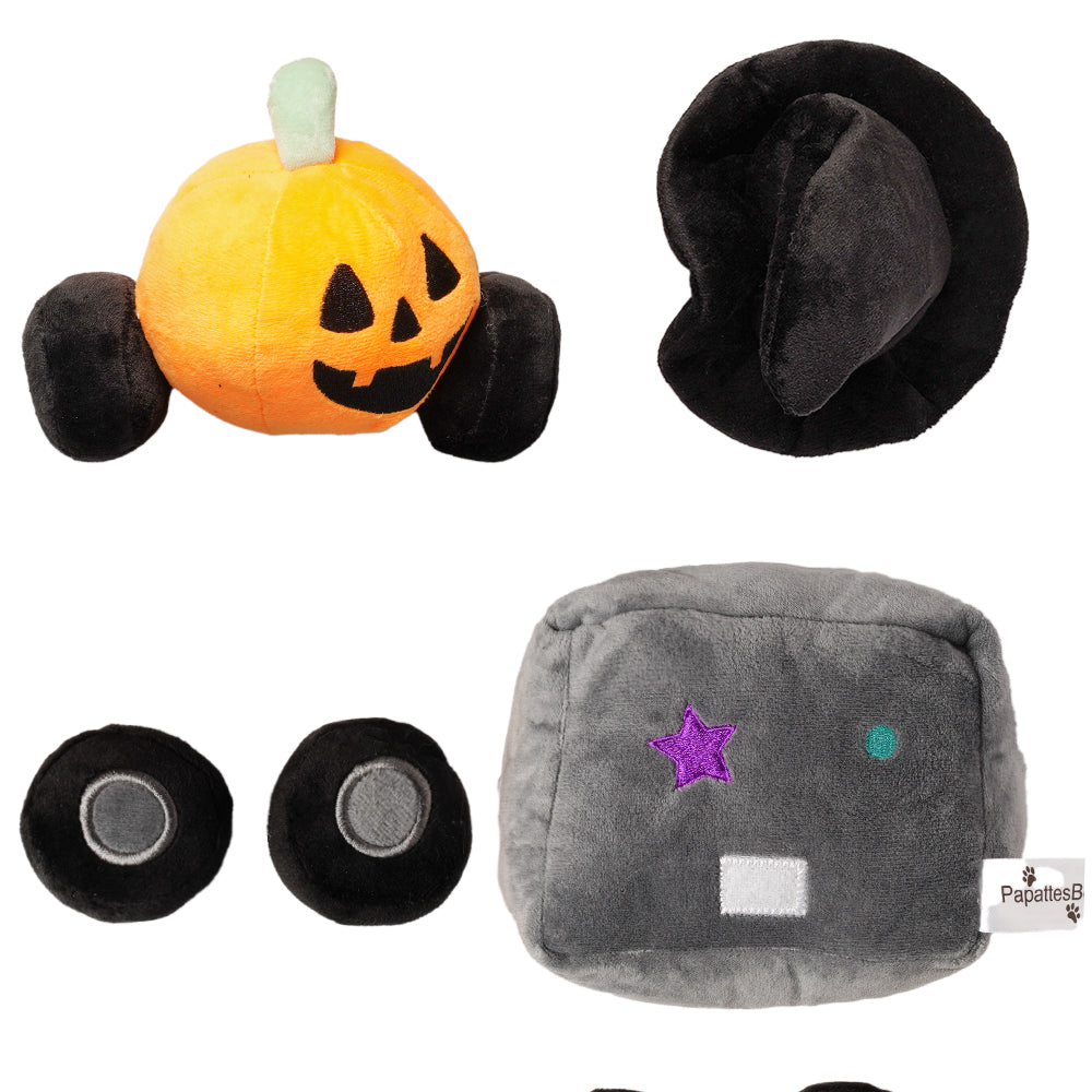 Ensemble de jouets pour chien PapattesBox Halloween Magic Train — toutes les pièces détachées : citrouille en peluche, chapeau de sorcière, wagon gris décoré d’étoiles violettes et roues amovibles.